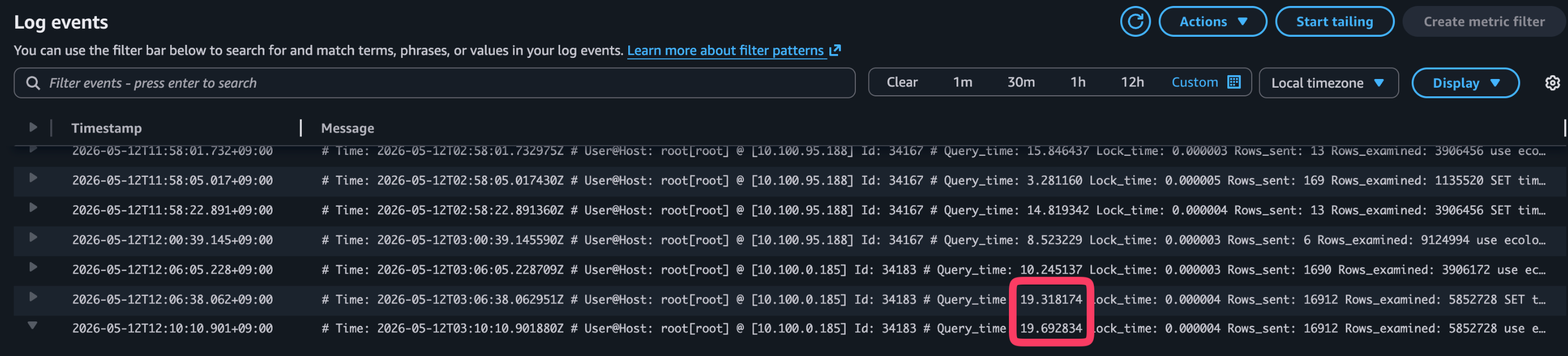MySQL slow query log の CloudWatch Logs 画面。1 年分の集計クエリで Query_time が 19.318174 および 19.692834 と記録されている